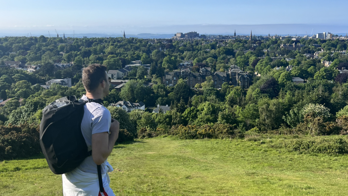 Barry Ryan overlooking Edinburgh from a hill