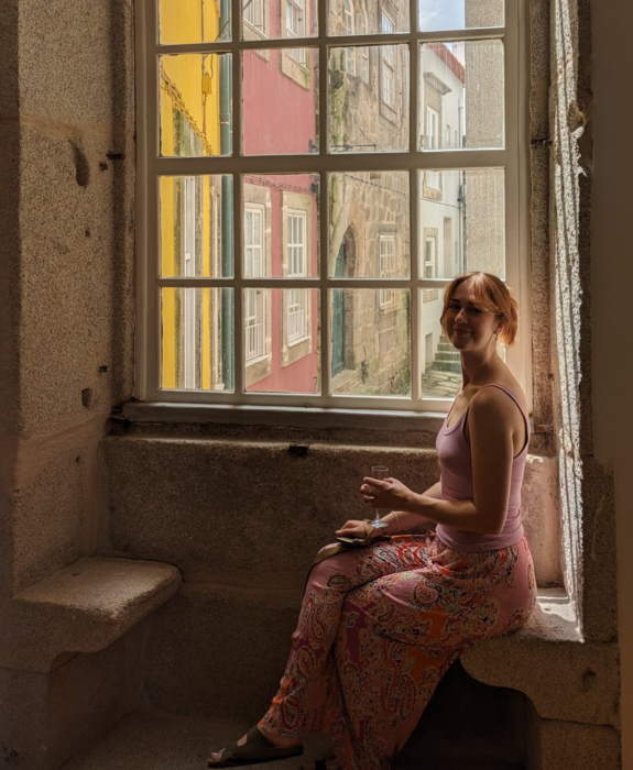 Holly Kerr by a window